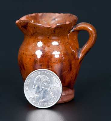 Miniature Redware Pitcher with Manganese Decoration