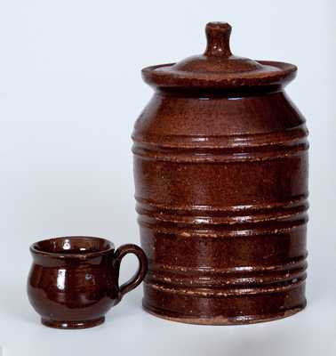 Two Pieces of Glazed Redware, Pennsylvania or New England origin, 19th century.