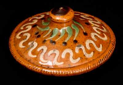 Exceptional Pennsylvania Redware Lid with Elaborate Slip Decoration