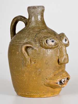 Rare Early-Period Stoneware Face Jug w/ Rock Eyes and Teeth, att. Lanier Meaders, Cleveland, GA