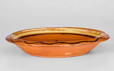 Fine Redware Bowl with Two-Color-Slip Floral Decoration, probably North Carolina