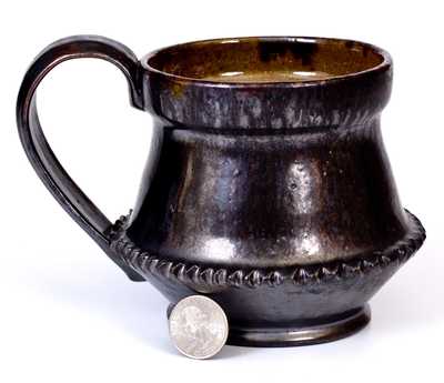 Large George Ohr Pottery Cup, Incised "Geo. E. Ohr," Biloxi, MS origin, late 19th or early 20th century.