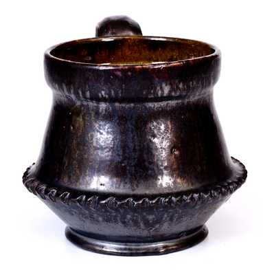 Large George Ohr Pottery Cup, Incised "Geo. E. Ohr," Biloxi, MS origin, late 19th or early 20th century.