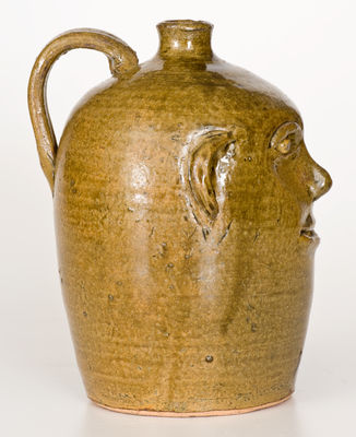 Alkaline-Glazed REGGIE MEADERS (Georgia) Stoneware Face Jug, late 20th century