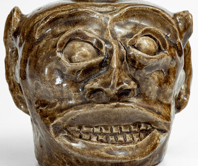 Rare and Important Edgefield District, SC Stoneware Face Harvest Jug w/ Elaborate Hand-Modeled Features