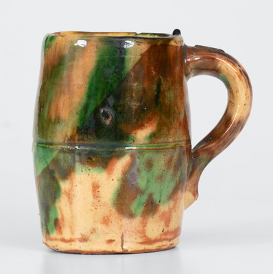 Multi-Glazed Redware Mug, Shenandoah Valley origin (Strasburg, Virginia)