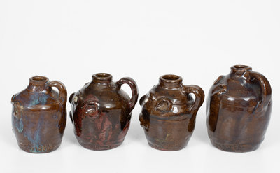 Lot of Four: Small-Sized Marie Rogers Face Jugs