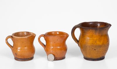 Lot of Three: Henry Schofield (Cecil County, MD) Redware Cream Pitchers