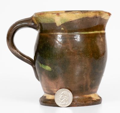 Multi-Glazed Redware Cream Pitcher, attributed to J. Eberly & Co., Strasburg, Virginia