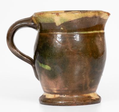 Multi-Glazed Redware Cream Pitcher, attributed to J. Eberly & Co., Strasburg, Virginia