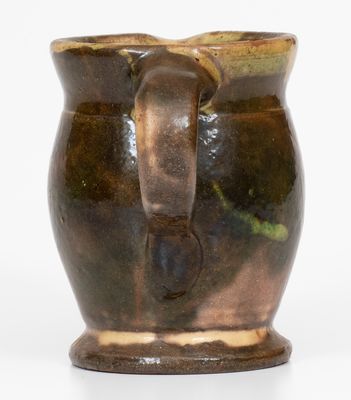 Multi-Glazed Redware Cream Pitcher, attributed to J. Eberly & Co., Strasburg, Virginia