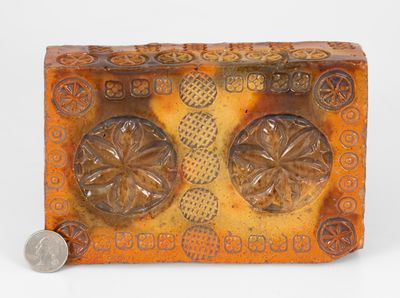 Rare Stamp-Decorated Redware Doorstop, PA origin, 19th century