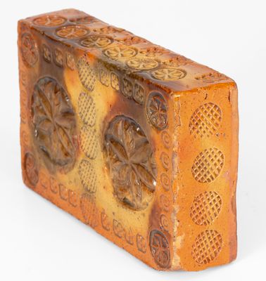 Rare Stamp-Decorated Redware Doorstop, PA origin, 19th century