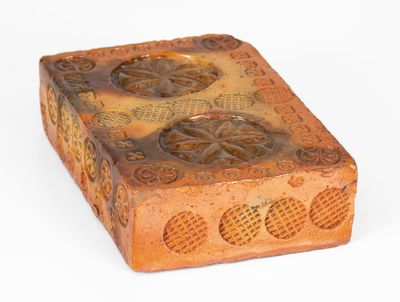 Rare Stamp-Decorated Redware Doorstop, PA origin, 19th century