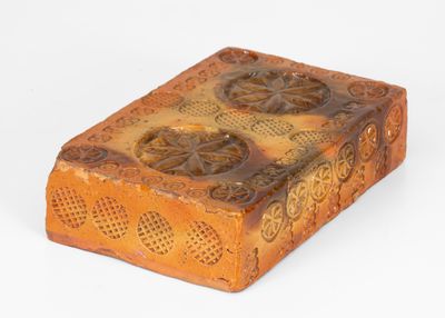 Rare Stamp-Decorated Redware Doorstop, PA origin, 19th century