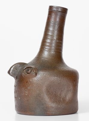 Rare Salt-Glazed Stoneware Face Bottle, Incised 