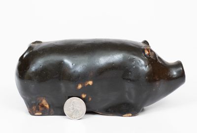 Albany-Slip-Glazed Stoneware Pig Bottle, Midwestern origin, circa 1885