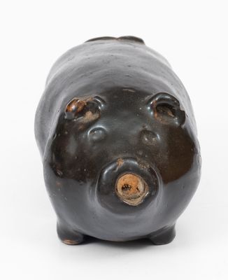 Albany-Slip-Glazed Stoneware Pig Bottle, Midwestern origin, circa 1885