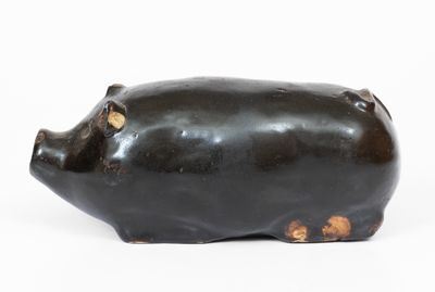 Albany-Slip-Glazed Stoneware Pig Bottle, Midwestern origin, circa 1885