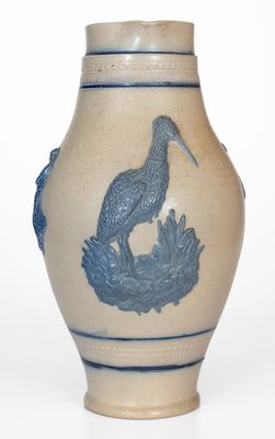 Cobalt-Decorated Stoneware Pitcher w/ Molded Stork and Human Motifs, attrib. White s Utica