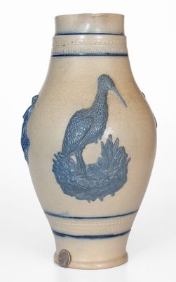 Cobalt-Decorated Stoneware Pitcher w/ Molded Stork and Human Motifs, attrib. White s Utica