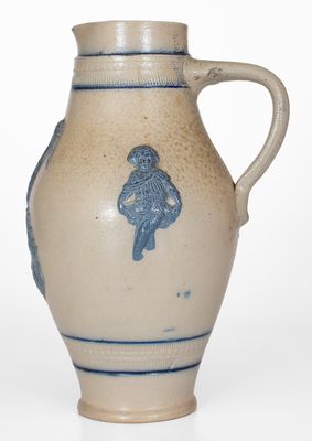 Cobalt-Decorated Stoneware Pitcher w/ Molded Stork and Human Motifs, attrib. White s Utica