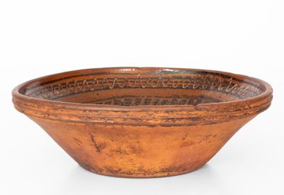 Large Slip-Decorated Hagerstown, Maryland Redware Bowl, early 19th century