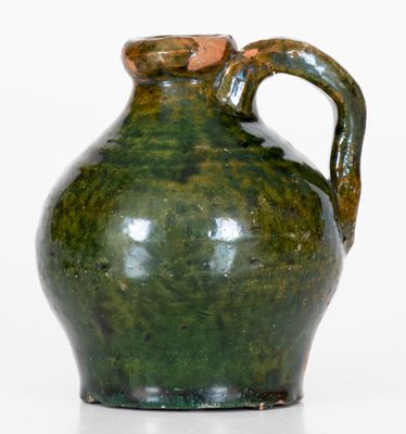 Fine Miniature Ovoid Massachusetts Redware Jug w/ Green Glaze, early 19th century