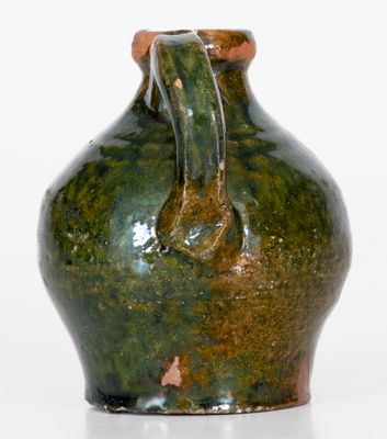 Fine Miniature Ovoid Massachusetts Redware Jug w/ Green Glaze, early 19th century