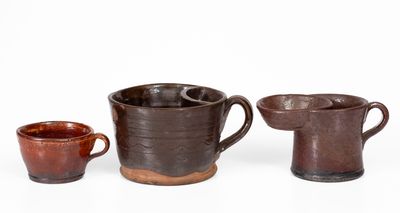 Lot of Three: Two Redware Shaving Mugs and Yellow Slip Decorated Redware Cup