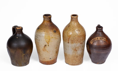 Four Small Stoneware Jugs w/ Dipped Slip, Northeastern U.S. origin, first quarter 19th century