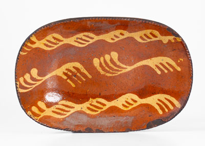 Slip-Decorated Pennsylvania Redware Loaf Dish, second quarter 19th century