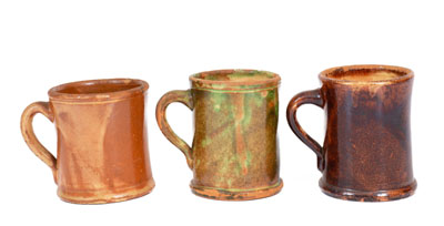 Three Glazed Shenandoah Valley Redware Mugs, Strasburg, Virginia