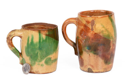 Two Multi-Glazed Redware Mugs, attributed to J. Eberly & Co., Strasburg, VA, c1890