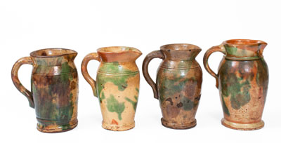 Four Multi-Glazed Redware Cream Pitchers, Bell or Eberly, Strasburg, VA