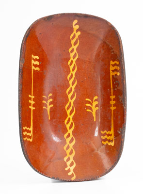 Redware Loaf Dish w/ Slip Decoration, Pennsylvania origin, second quarter 19th century