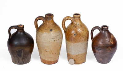 Four Small Stoneware Jugs w/ Dipped Slip, Northeastern U.S. origin, first quarter 19th century