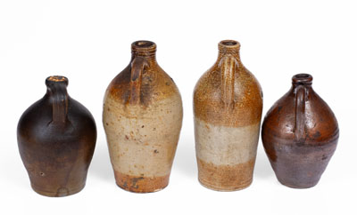 Four Small Stoneware Jugs w/ Dipped Slip, Northeastern U.S. origin, first quarter 19th century