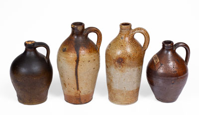 Four Small Stoneware Jugs w/ Dipped Slip, Northeastern U.S. origin, first quarter 19th century