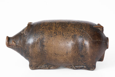 Albany-Glazed Stoneware Pig Bottle, Midwestern, c1880