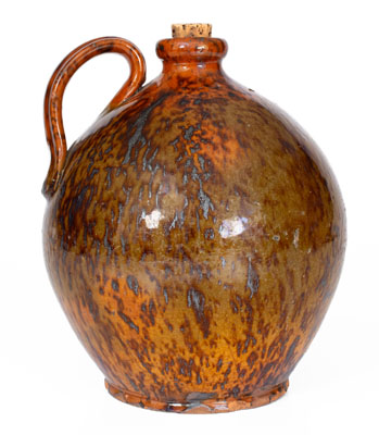 Manganese-Decorated Pennsylvania Redware Jug, 19th century