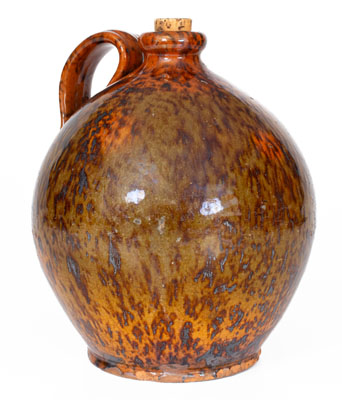 Manganese-Decorated Pennsylvania Redware Jug, 19th century