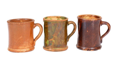 Three Glazed Shenandoah Valley Redware Mugs, Strasburg, Virginia