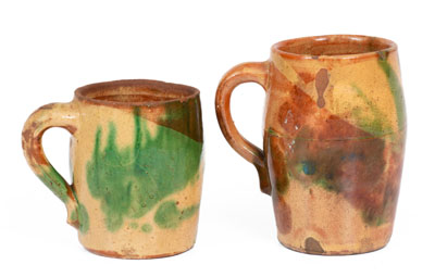 Two Multi-Glazed Redware Mugs, attributed to J. Eberly & Co., Strasburg, VA, c1890