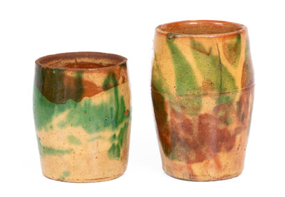 Two Multi-Glazed Redware Mugs, attributed to J. Eberly & Co., Strasburg, VA, c1890