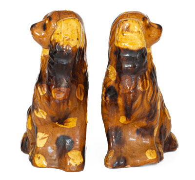 Scarce Pair of Slip-Decorated Pennsylvania Redware Spaniels, 19th century