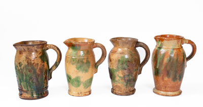 Four Multi-Glazed Redware Cream Pitchers, Bell or Eberly, Strasburg, VA