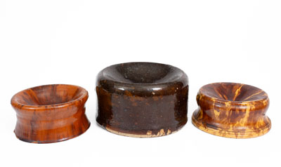 Three Glazed Pottery Spittoons, American, 19th century