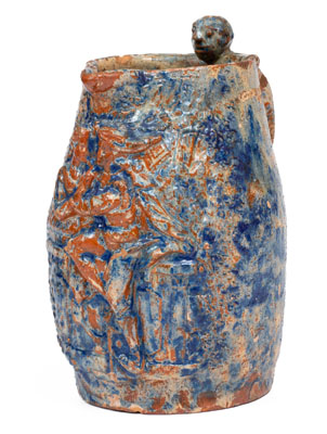 Unusual Cobalt Decorated Redware Pitcher w/ Relief Decoration and Figural Handle