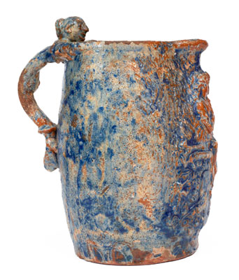 Unusual Cobalt Decorated Redware Pitcher w/ Relief Decoration and Figural Handle